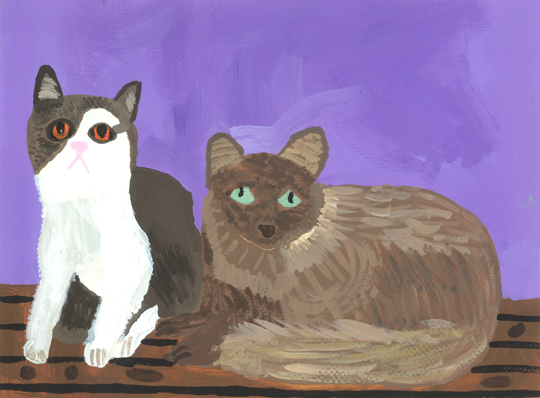 Two cats sat on wood